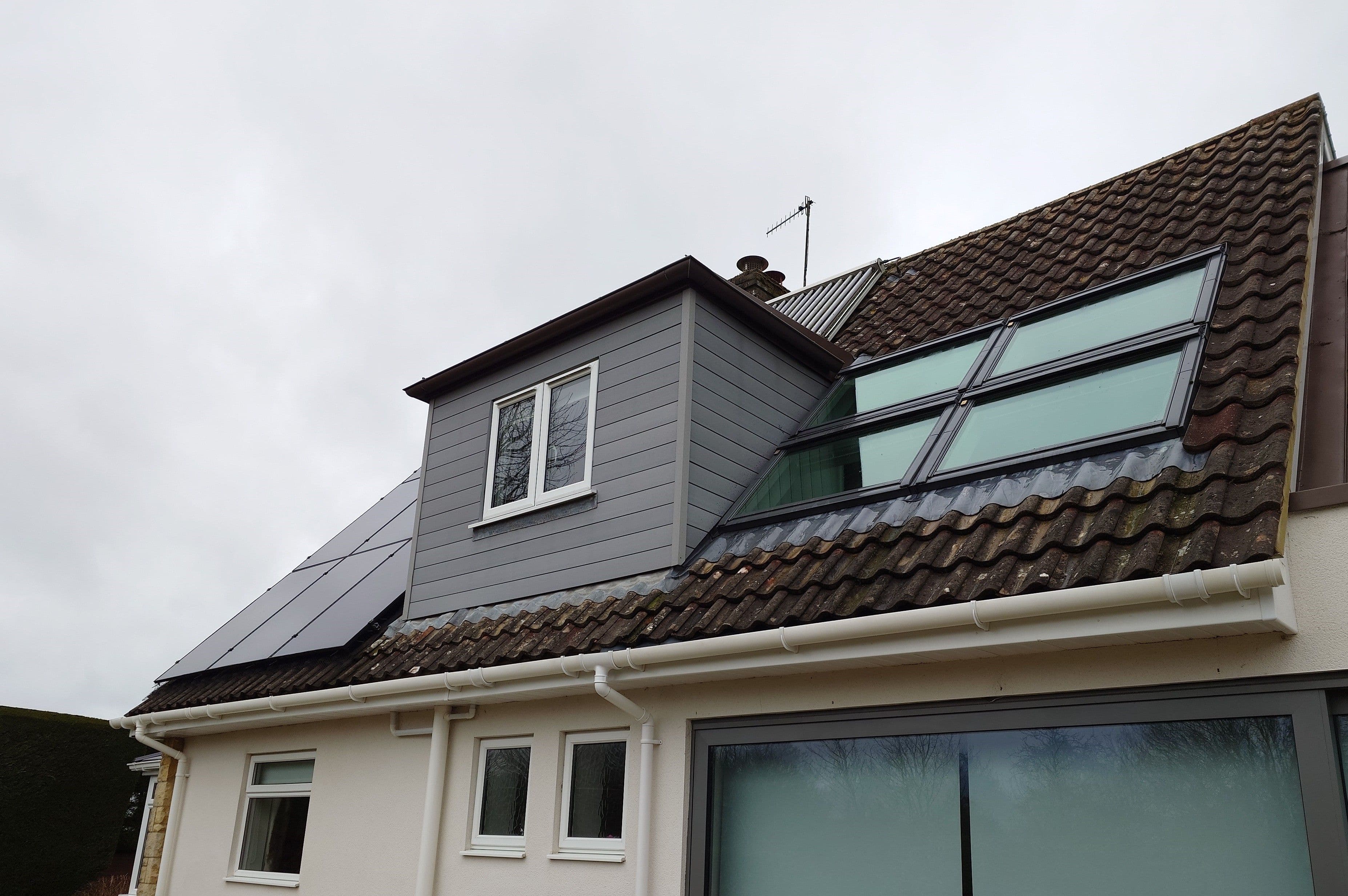 Roof scrape and gutter clean down.